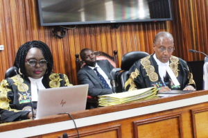 i.	Hon. Justice Richard Buteera (right), Deputy Chief Justice and Head of the Court of Appeal of Uganda 